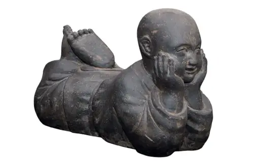 Product image of the product “Lying monk, 60 cm width, cast stone, hollow, handcrafted & coloured 60 cm (hollow)”