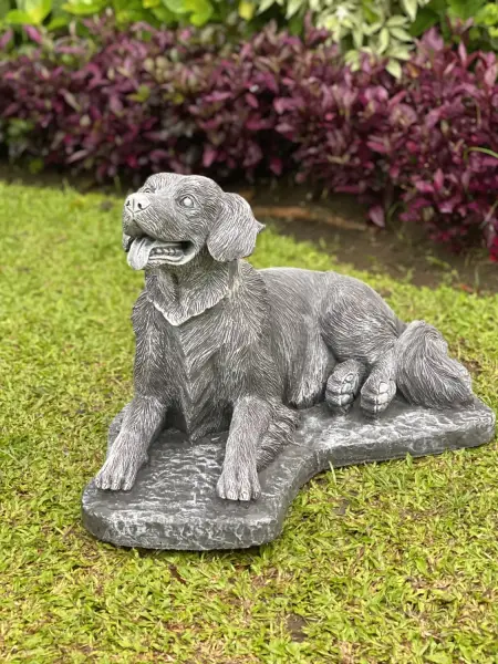 Product image 1 of the product “Cooper - Golden Retriver, lying on base 68cm L | cast stone ”