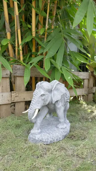Product image 1 of the product “Nandi - Small Elephant bending to the right, 45cm L | cast stone ”