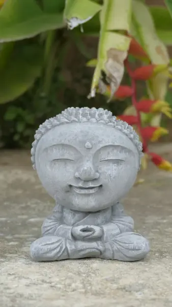 Product image 1 of the product “Nima - Sitting monk with big head, 15 cm H | cast stone ”