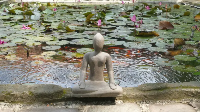 Product image 1 of the product “Sitting woman in yoga position - lotus position, 30cm high. Cast stone, handcrafted & colored 30 cm”
