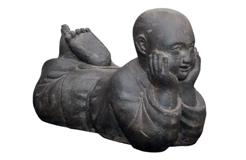 Product image 1 of the product “Lying monk, 60 cm width, cast stone, hollow, handcrafted & coloured 60 cm (hollow)”