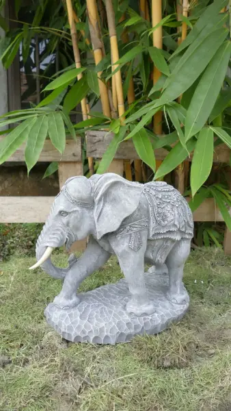 Product image of the product “Nandi - Small Elephant bending to the right, 45cm L | cast stone ”