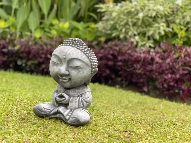 Product image of the product “Nima - Sitting monk with big head, 22 cm H | cast stone ”