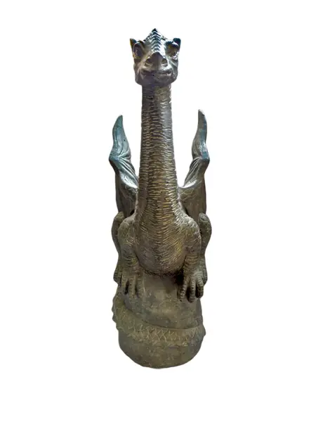 Product image of the product “Sitting dragon on a rock. Dyed in the color antique finish. In the sizes from 60 to 75cm. ”