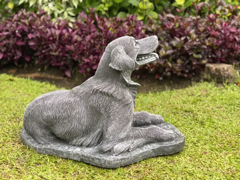 Product image 3 of the product “Cooper - Golden Retriver, lying on base 68cm L | cast stone ”