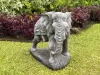  Product image 1 of the product “Avan - Elephant with blanket, looking to the right. 63 cm L | cast stone ”