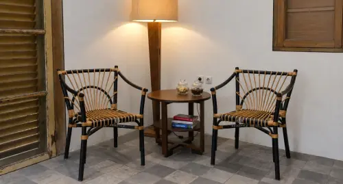 Product image of the product “Kasiruta armchair made of rattan about 80cm height. Black Color. ”