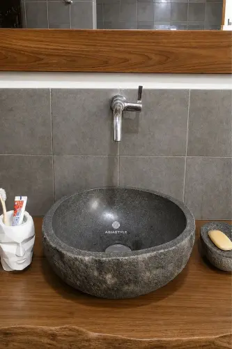 Product image of the product “Sink / washtafel of riverstone in a open carton about 45cm diameter 45 cm”