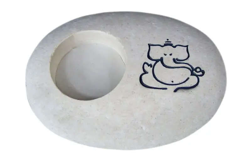 Product image 1 of the product “Stone with Ganesha calligraphy as T-light holder ”