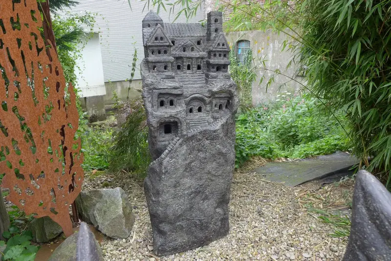 Product image of the product “Castle, Dragonrock, approx. 100cm height, casr stone, hollow, handcrafted & coloured 100 cm”
