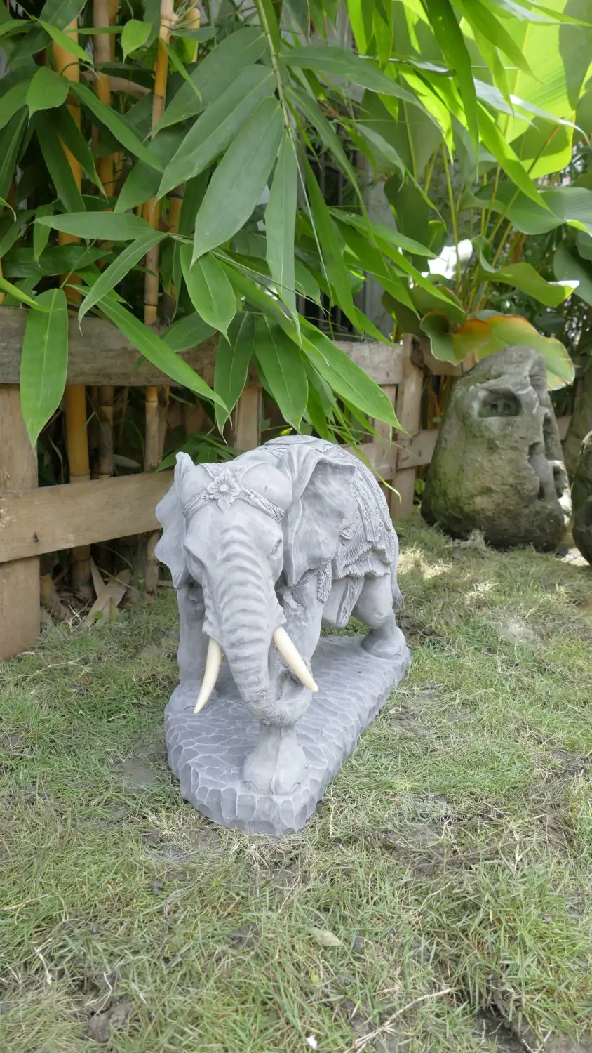  Product image 1 of the product “Indra - Small Elephant bending to the left, 46.5cm L | cast stone ”