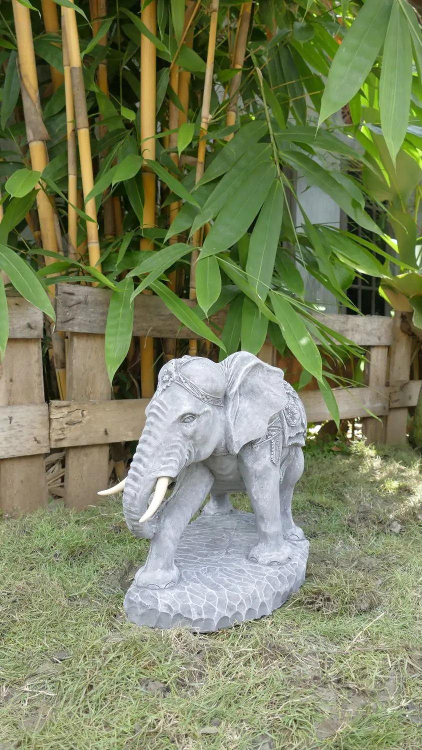  Product image 1 of the product “Nandi - Small Elephant bending to the right, 45cm L | cast stone ”