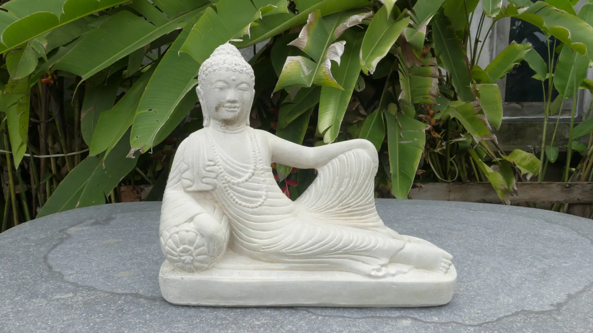  Product image 1 of the product “Half Reclining Buddha, India, 31 cm height, cast stone, handcrafted & coloured ”