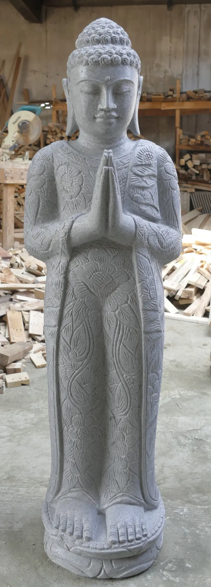  Product image 1 of the product “Standing Buddha with floral carving, Greeting position. 39 x 30 x 129cm. Natural stone (river stone), stonemasonry ”