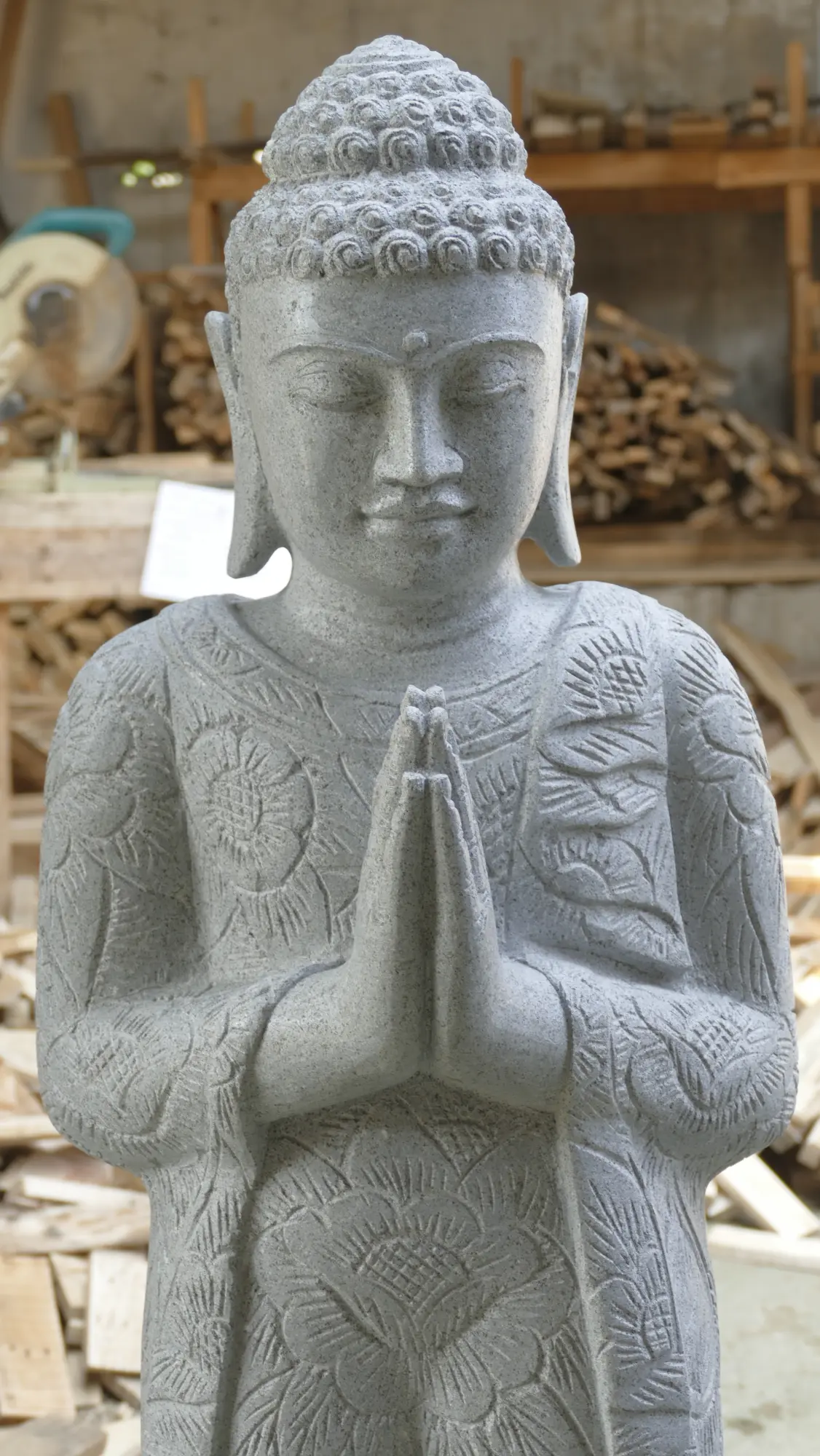  Product image 2 of the product “Standing Buddha with floral carving, Greeting position. 39 x 30 x 129cm. Natural stone (river stone), stonemasonry ”
