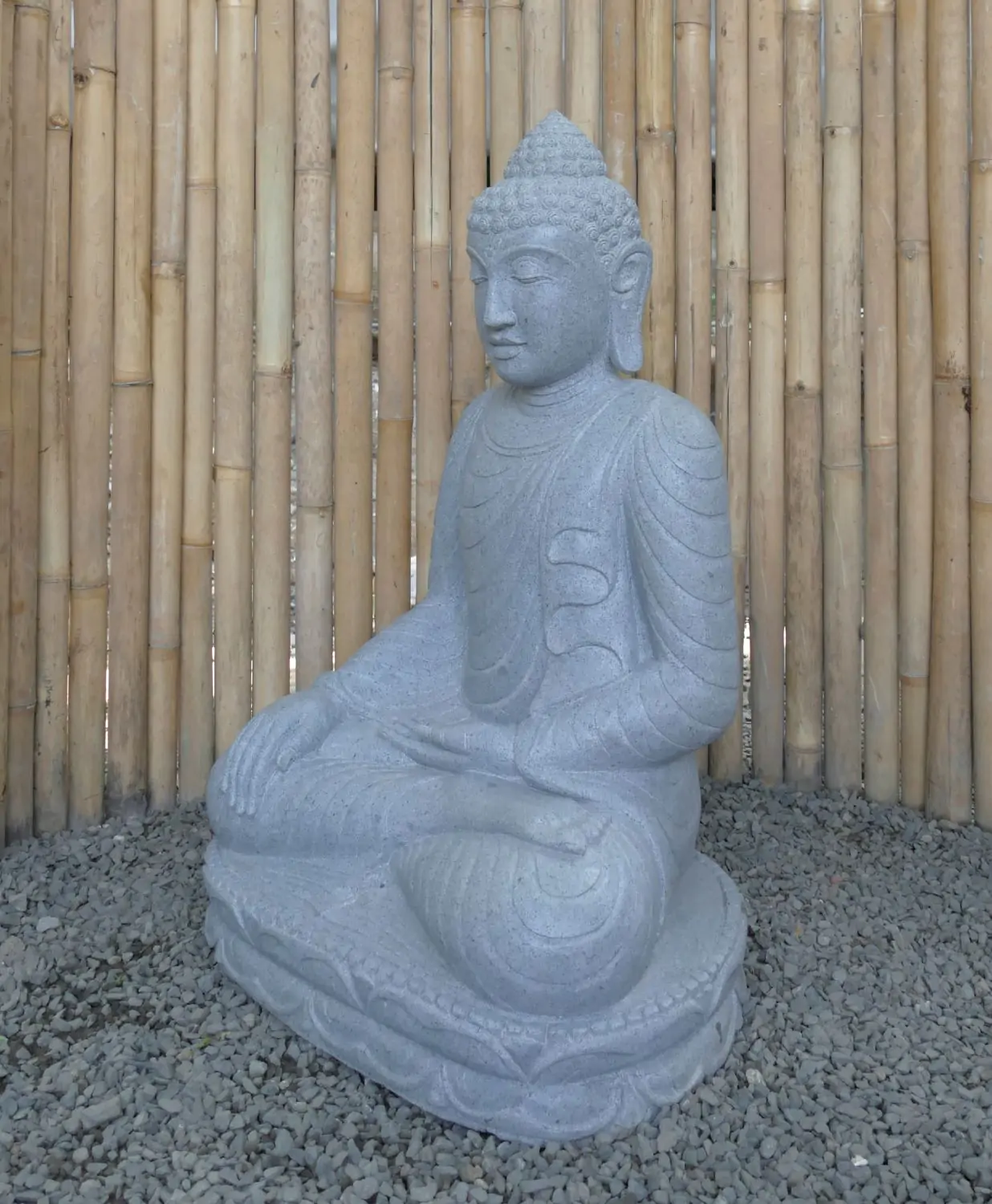  Product image 2 of the product “Seated Buddha made of Riverstone in Bhumisparsha - gesture of touching the earth. 80cm height. ”