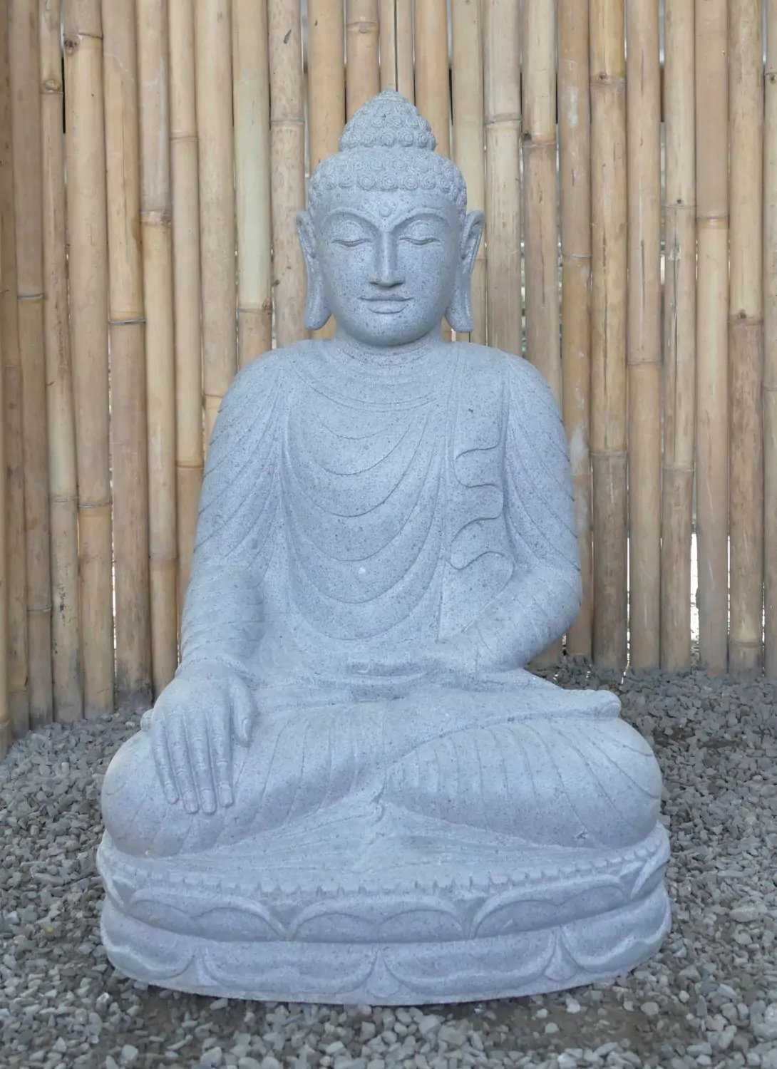  Product image 2 of the product “Seated Buddha made of Riverstone in Bhumisparsha - gesture of touching the earth. 82cm height. ”