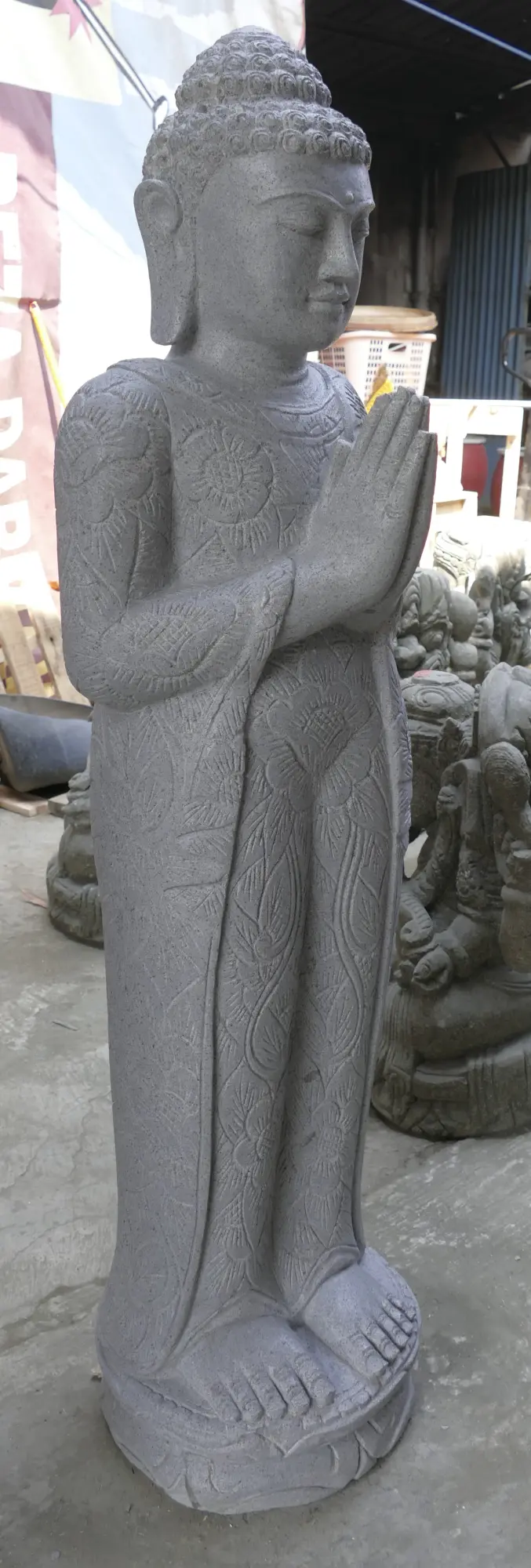 Product image 3 of the product “Standing Buddha with floral carving, Greeting position. 39 x 30 x 129cm. Natural stone (river stone), stonemasonry ”