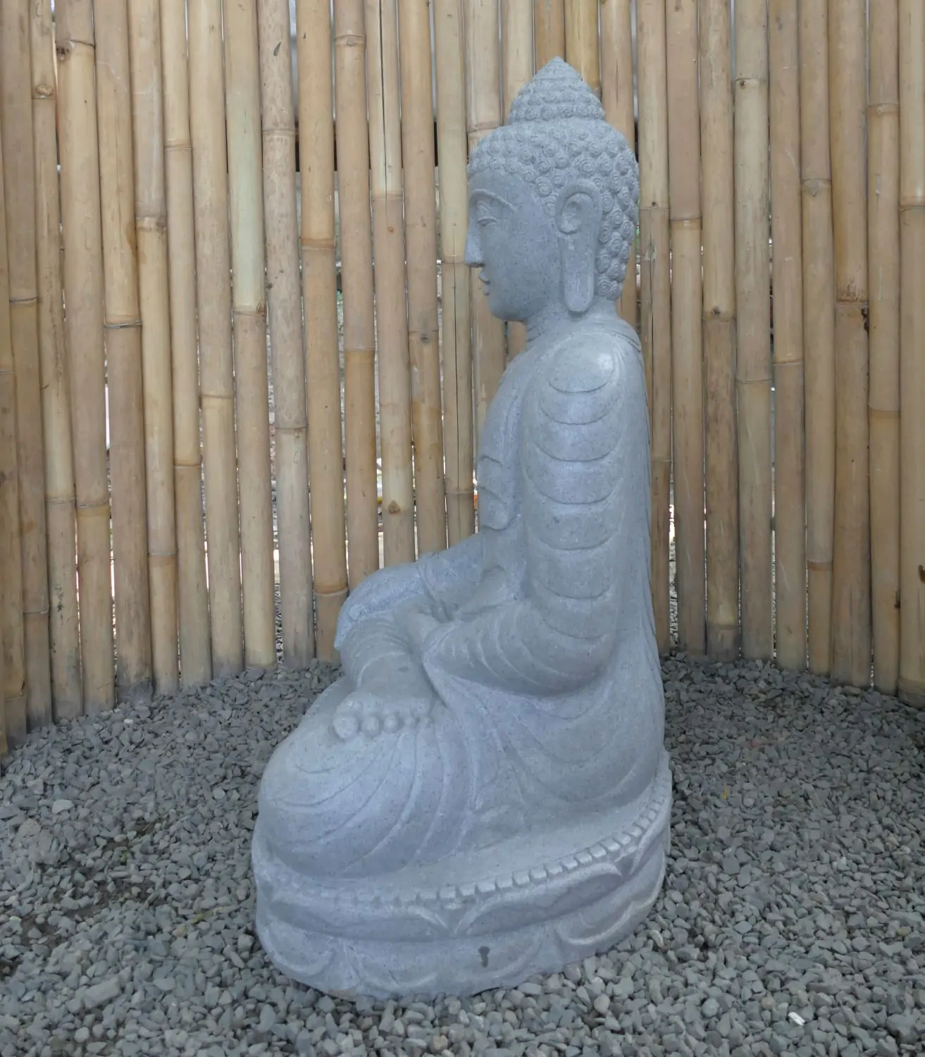 Product image 3 of the product “Seated Buddha made of Riverstone in Bhumisparsha - gesture of touching the earth. 80cm height. ”