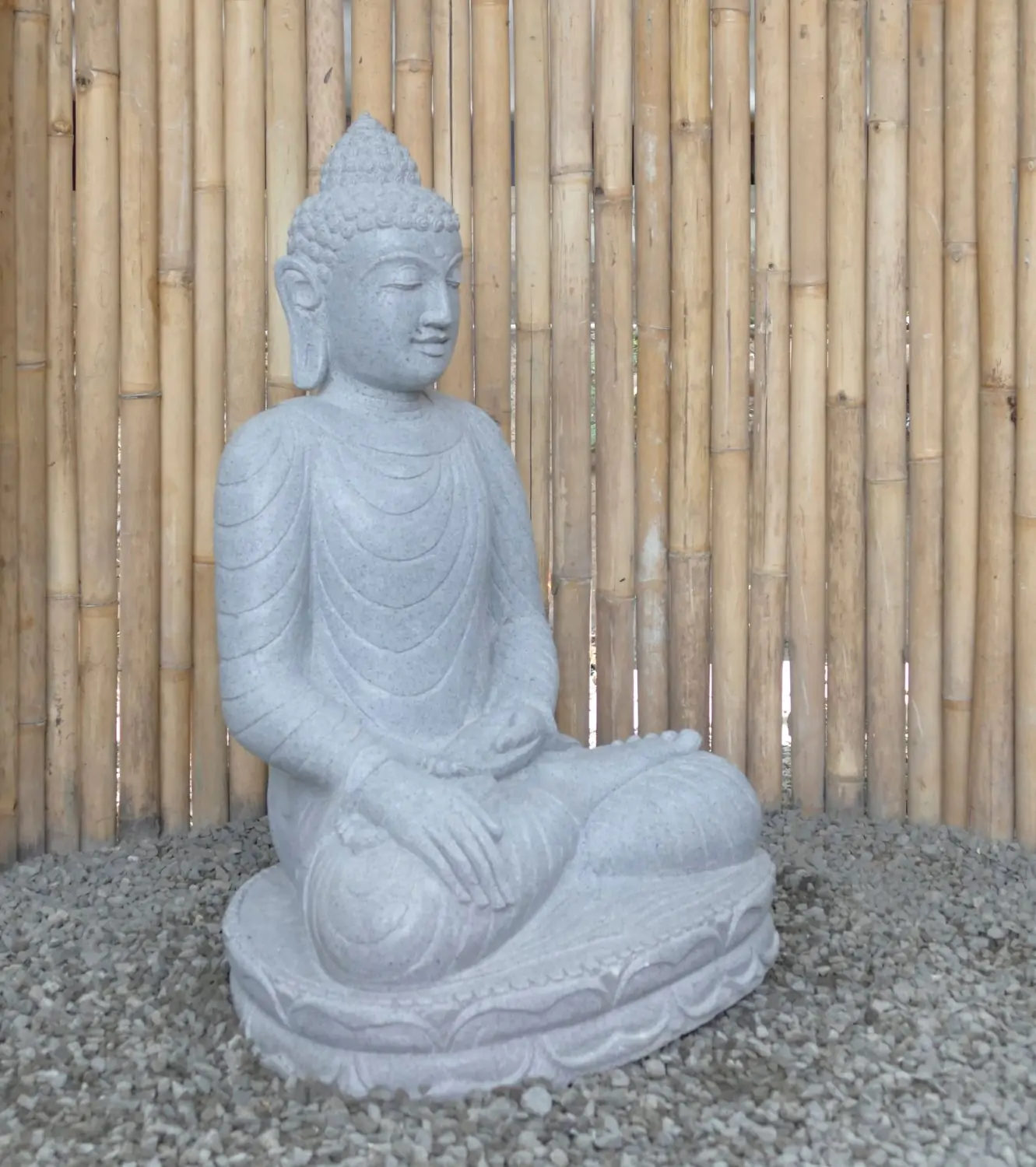  Product image 3 of the product “Seated Buddha made of Riverstone in Bhumisparsha - gesture of touching the earth. 83cm height. ”