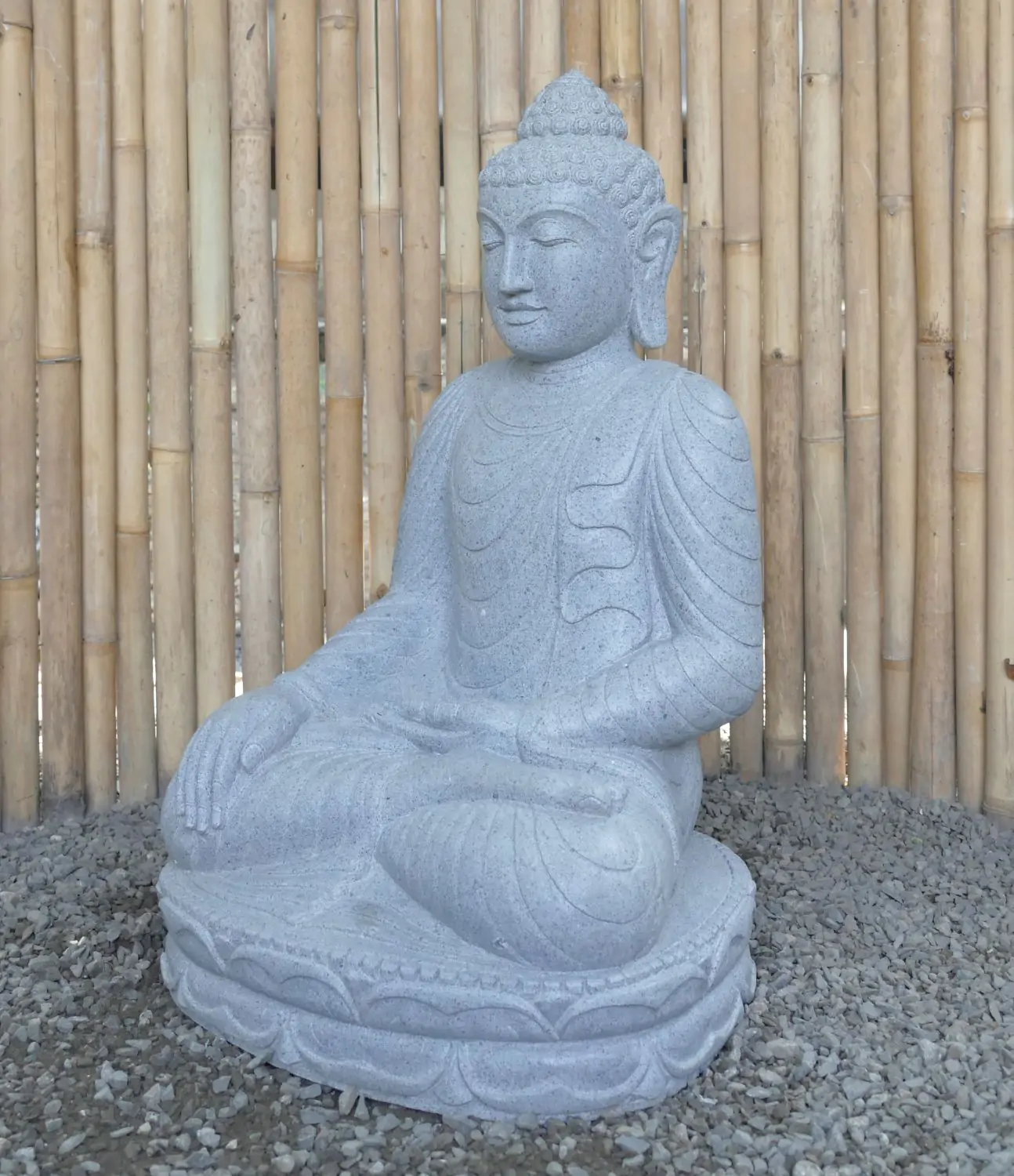  Product image 3 of the product “Seated Buddha made of Riverstone in Bhumisparsha - gesture of touching the earth. 82cm height. ”