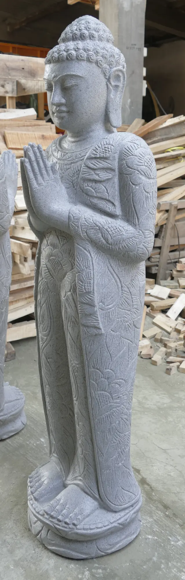  Product image 4 of the product “Standing Buddha with floral carving, Greeting position. 39 x 30 x 129cm. Natural stone (river stone), stonemasonry ”