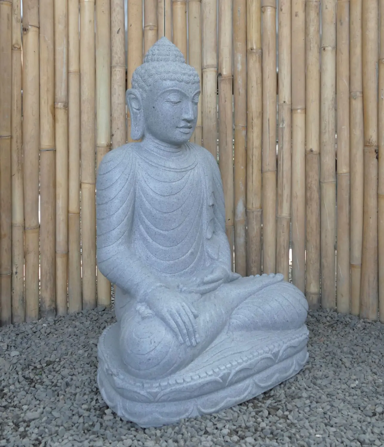  Product image 4 of the product “Seated Buddha made of Riverstone in Bhumisparsha - gesture of touching the earth. 80cm height. ”