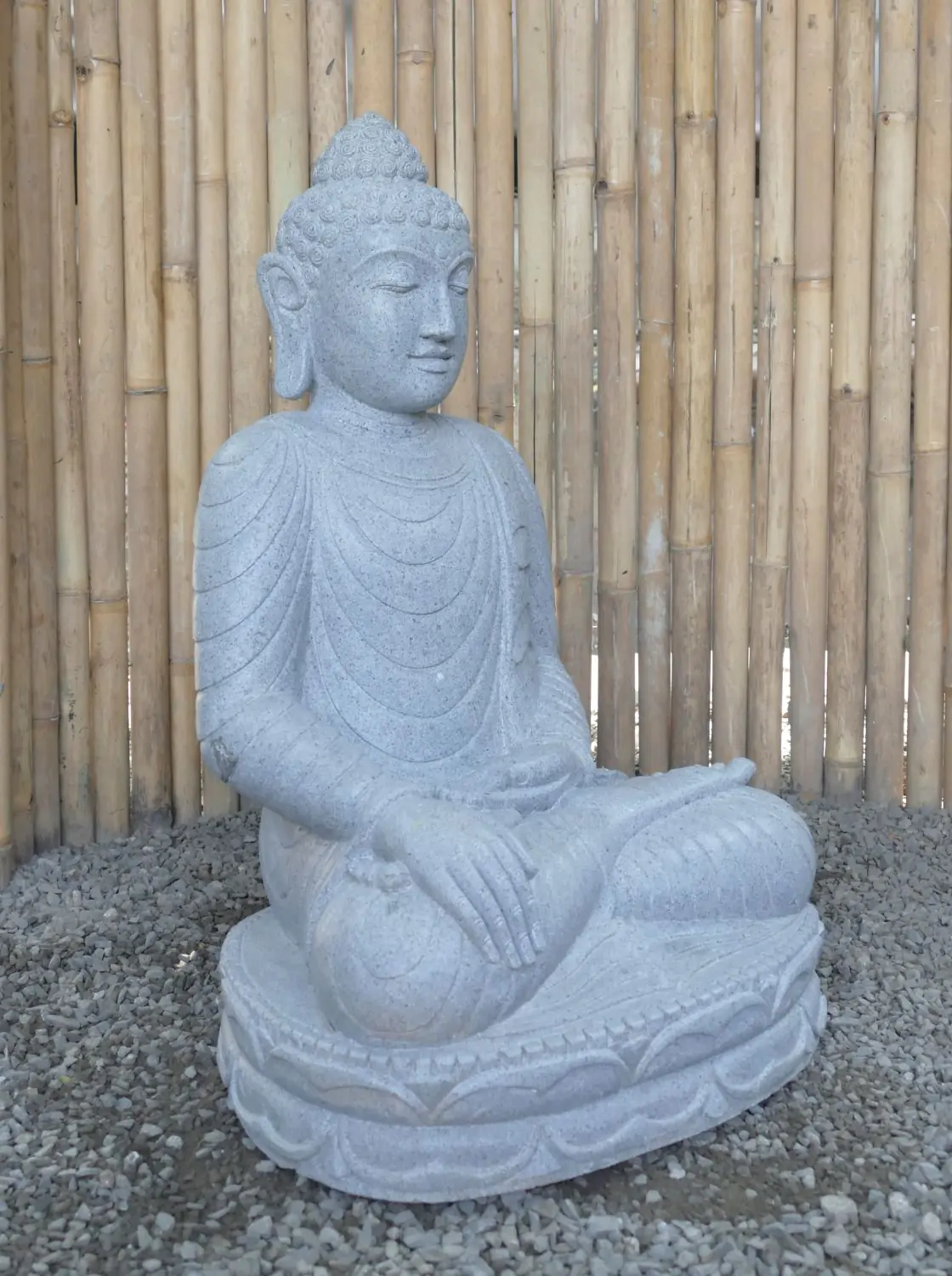  Product image 4 of the product “Seated Buddha made of Riverstone in Bhumisparsha - gesture of touching the earth. 82cm height. ”