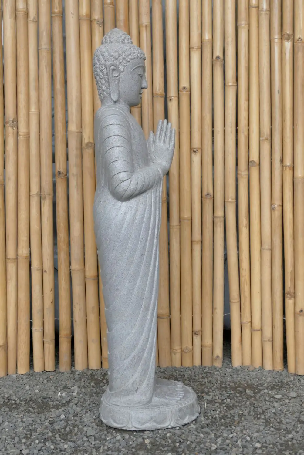  Product image 4 of the product “Standing Buddha made of Riverstone, position Namaskara , H. 122cm. ”