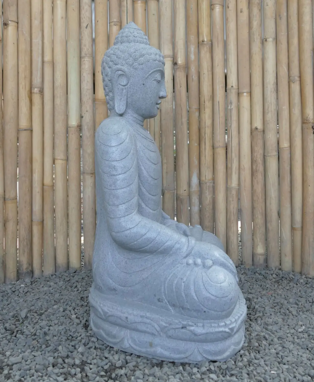 Product image 5 of the product “Seated Buddha made of Riverstone in Bhumisparsha - gesture of touching the earth. 80cm height. ”