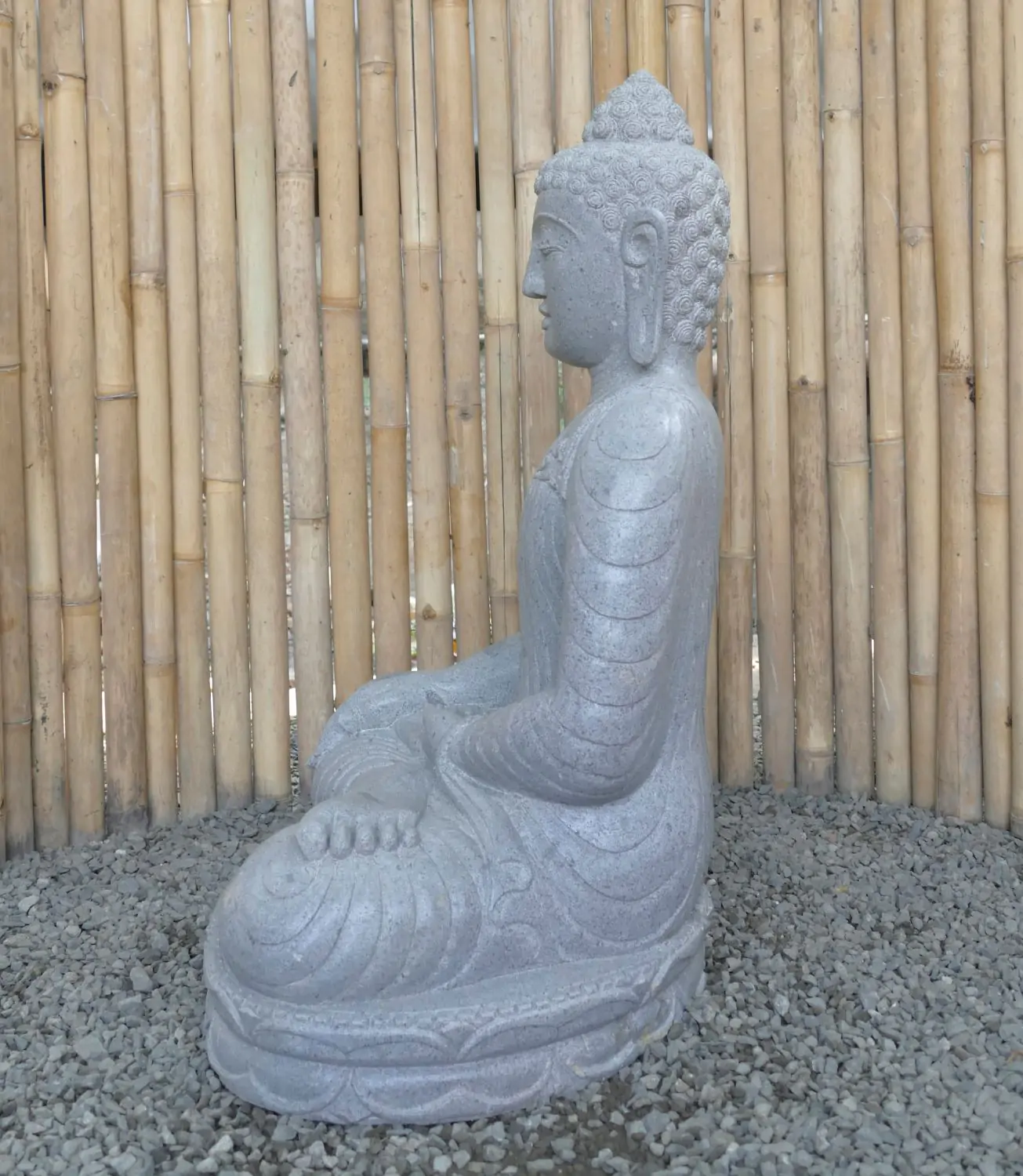  Product image 5 of the product “Seated Buddha made of Riverstone in Bhumisparsha - gesture of touching the earth. 86cm height. ”