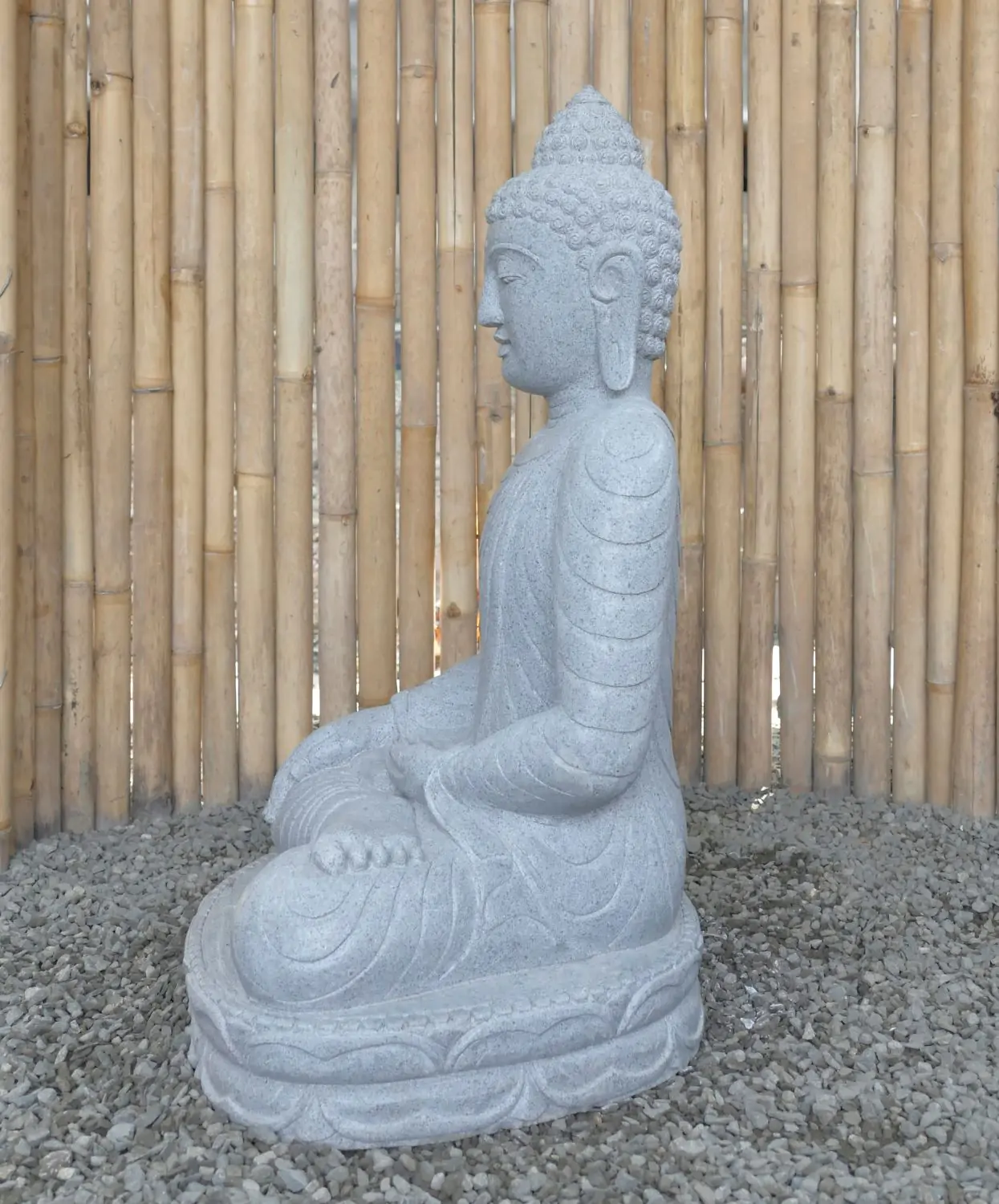  Product image 5 of the product “Seated Buddha made of Riverstone in Bhumisparsha - gesture of touching the earth. 83cm height. ”